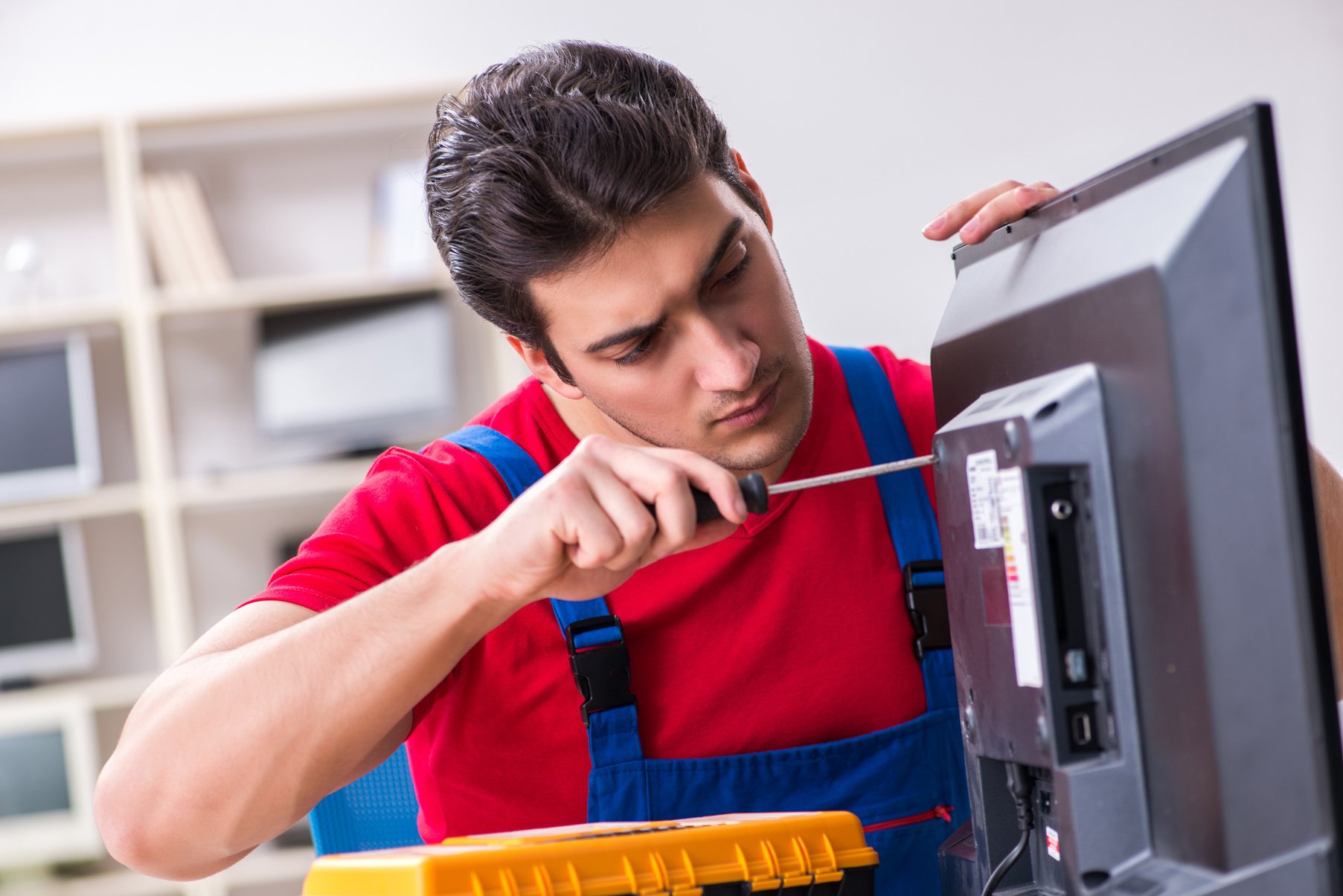 Professional Repair Engineer Repairing Broken Tv